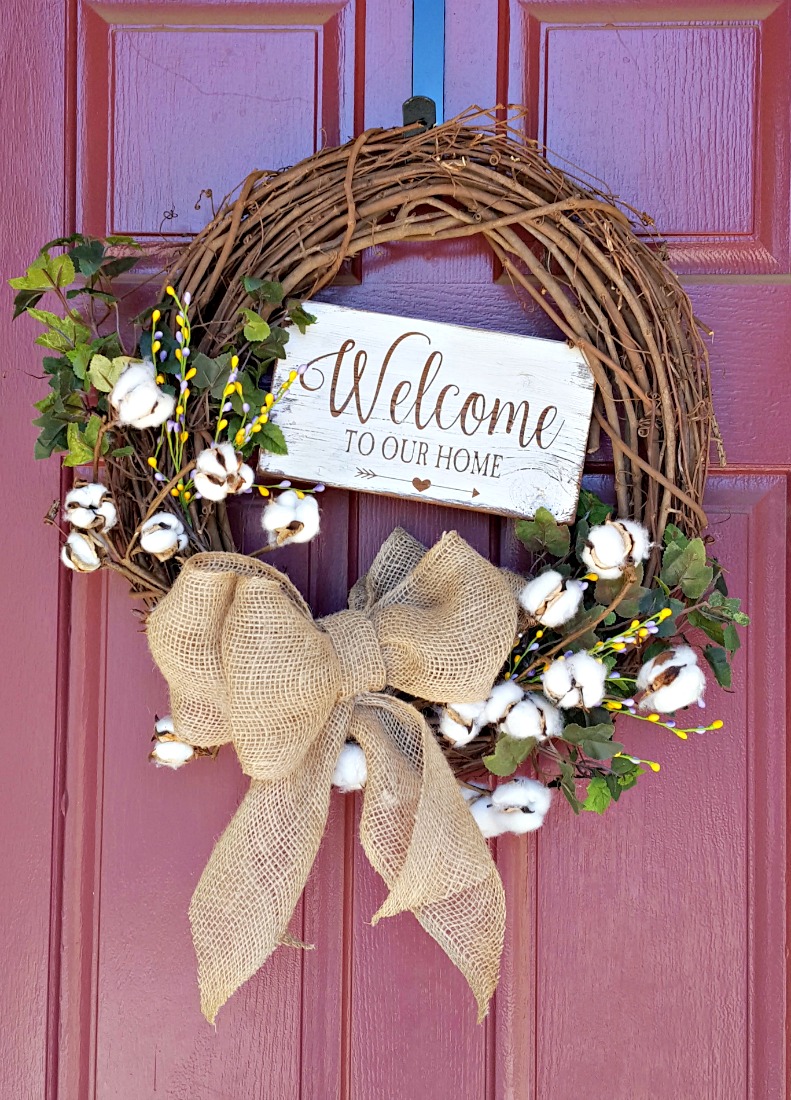DIY grapevine spring wreath tutorial with welcome to our home sign