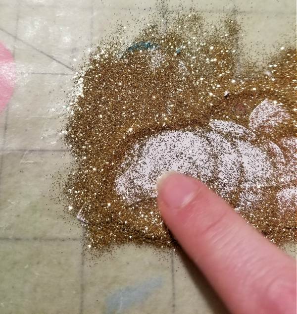 adding glitter to silly wink sheets