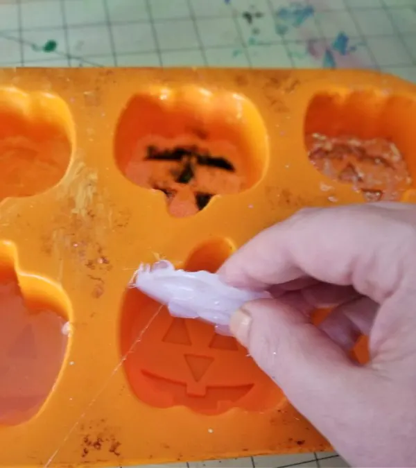 popping dried hot glue out of silicone mold