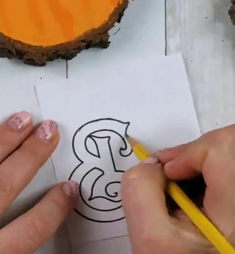 transferring letters to wood with pencil