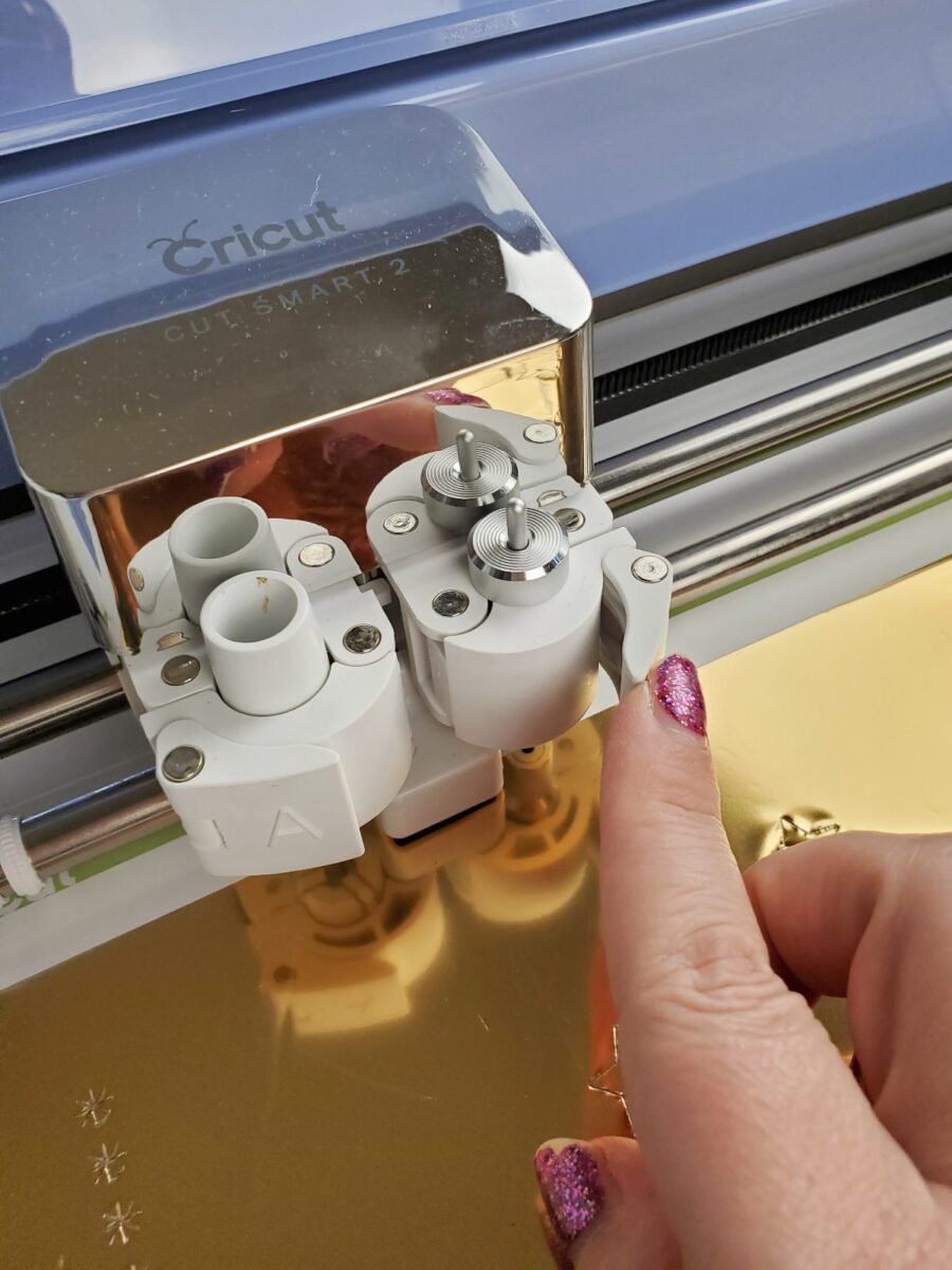 placing cricut fine point blade housing in clamp