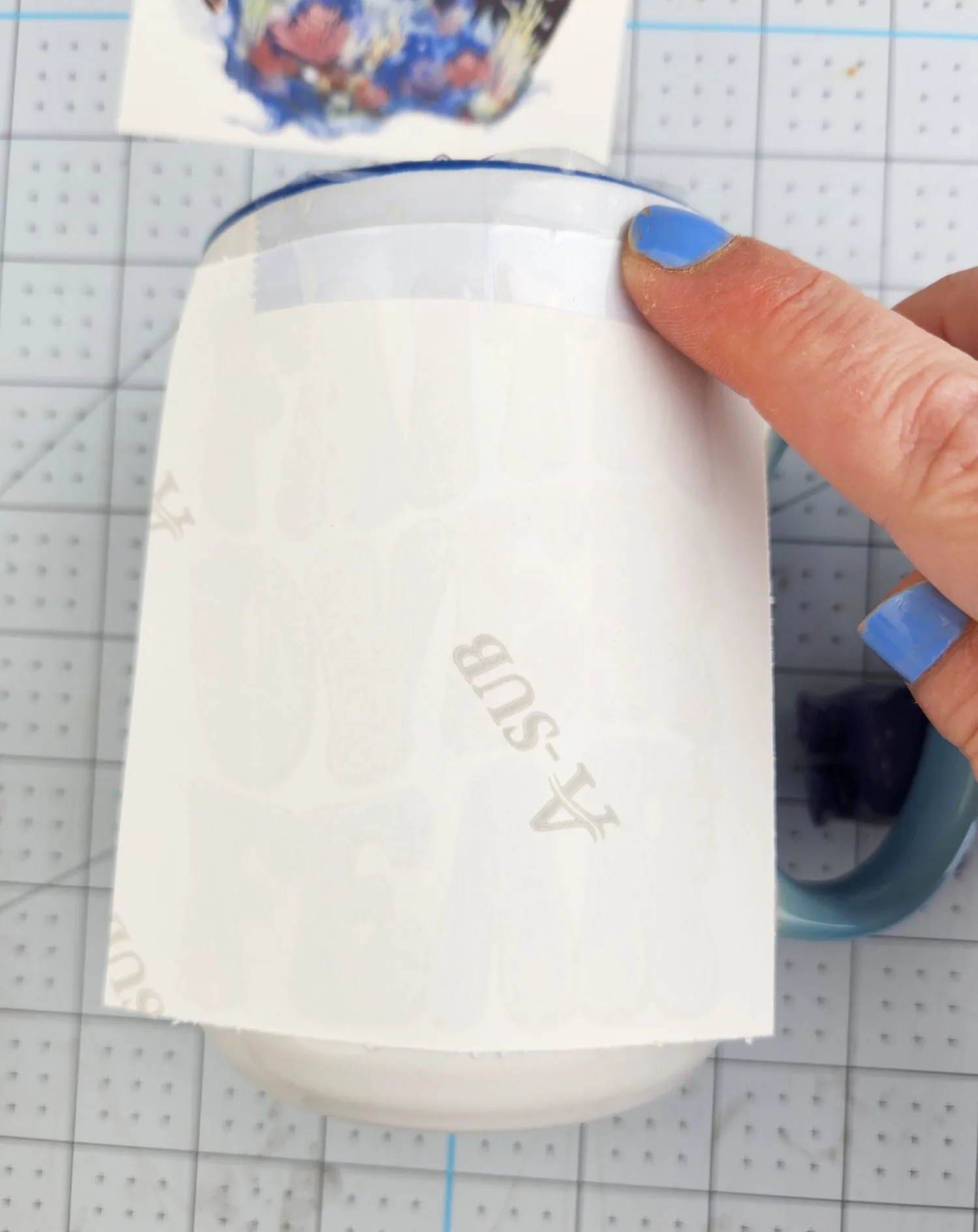 taping sublimation image on mug